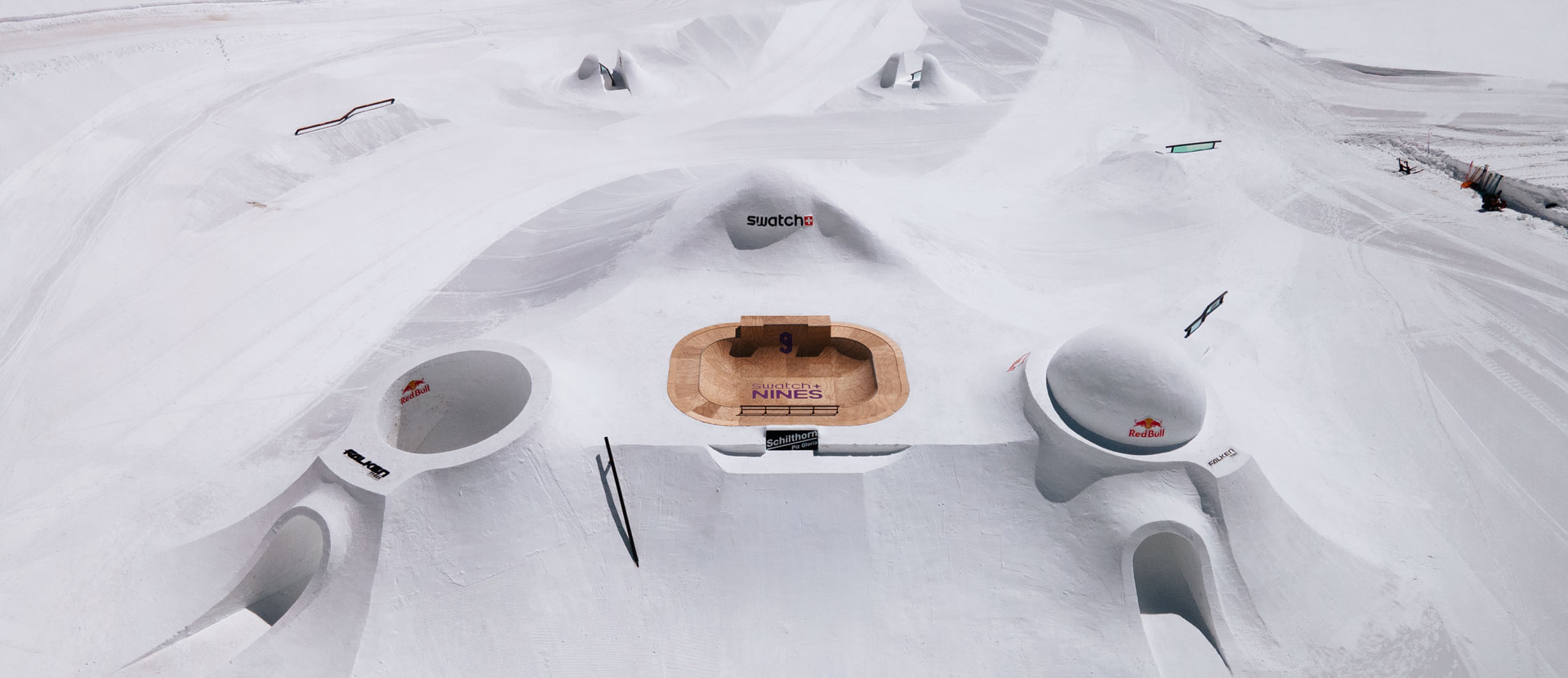 Pro setup at Audi Nines 2023 at Schilthorn with spectacular snow features and kicker lines.