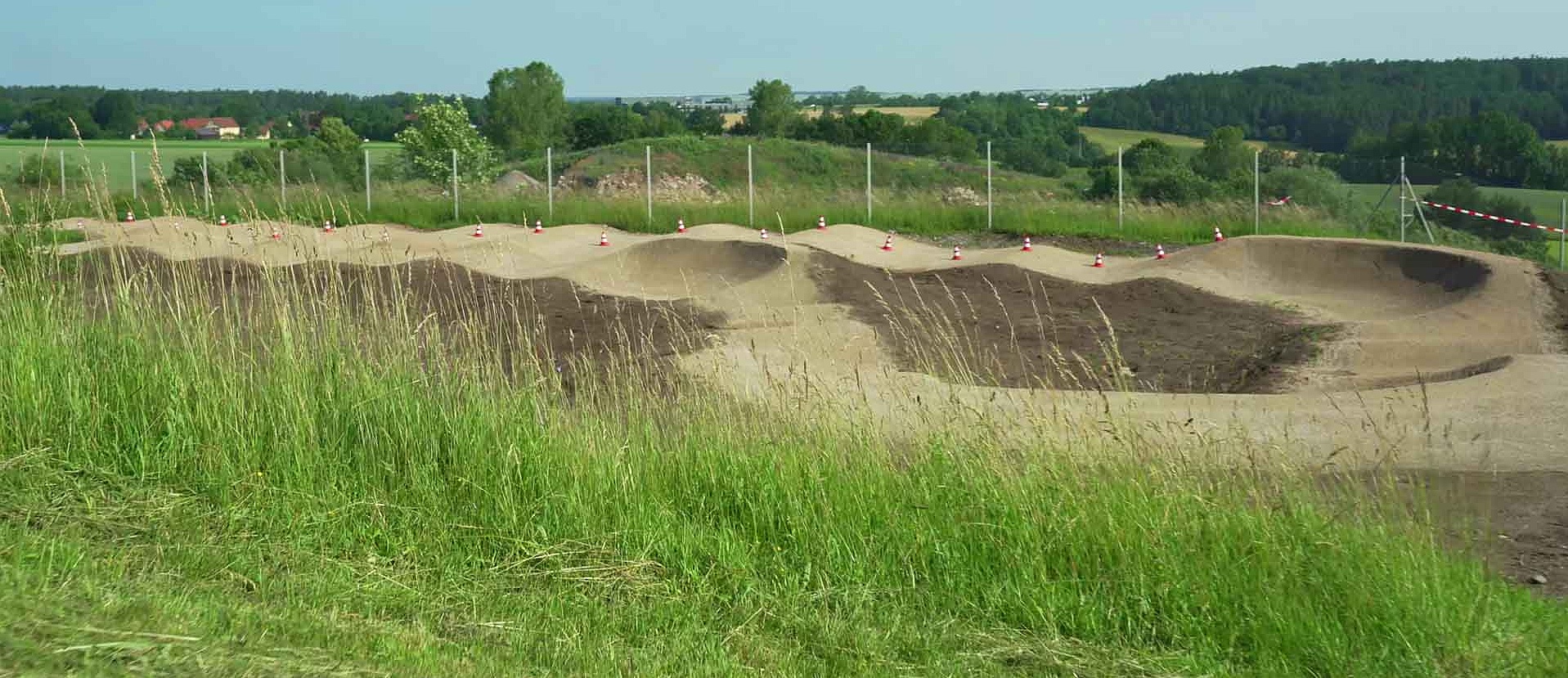 Pump track section in Herrieden Bike Park shaped from dirt
