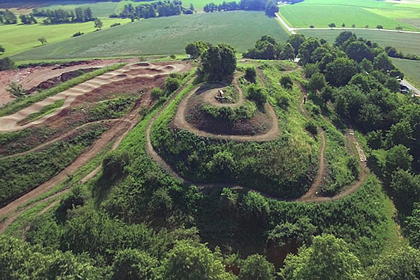 Aerial view of Herrieden Bike Park with trails on the hill