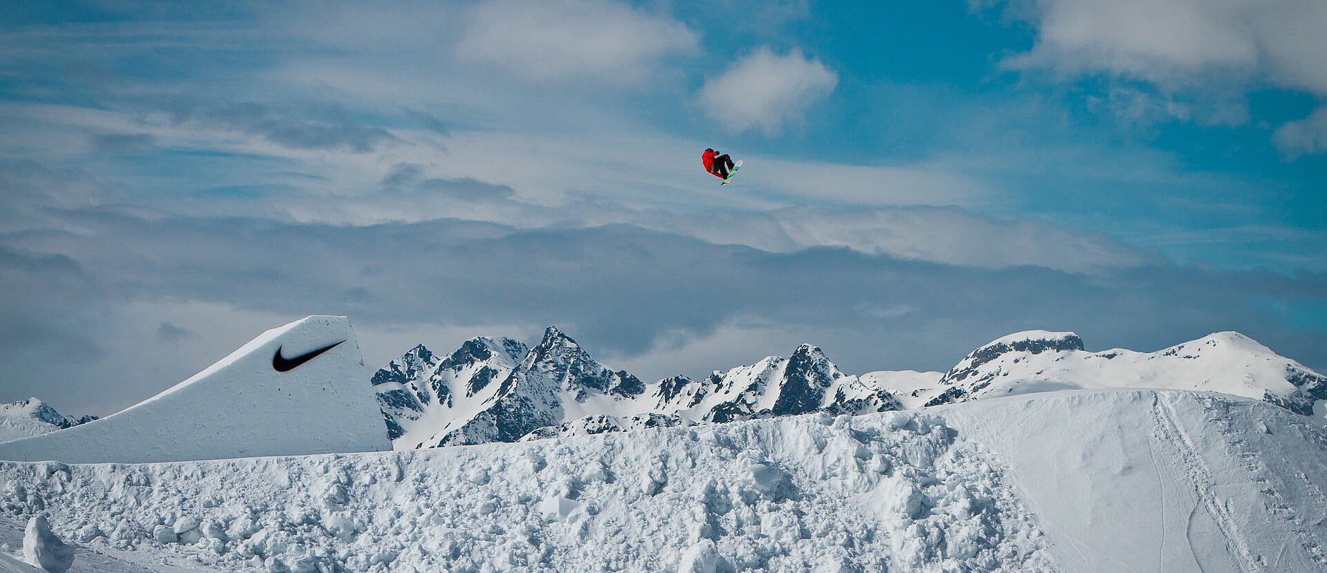 Snowboarder in the air after a jump