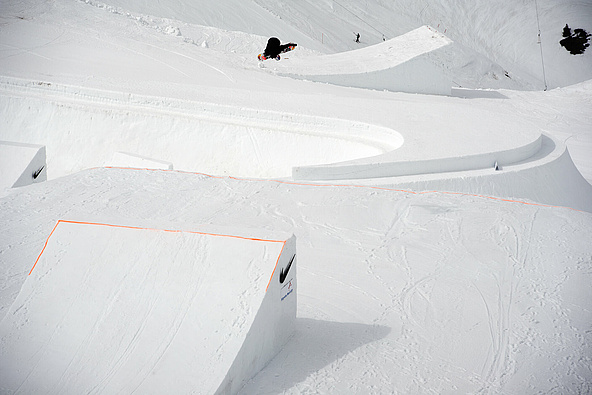 Snowpark in the form of Nike logo with athlete