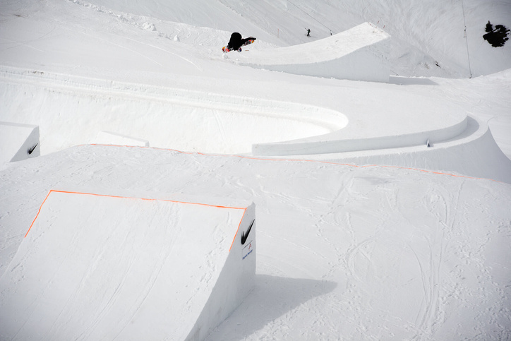 Snowpark in the form of Nike logo with athlete