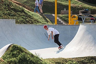 Skateboarder in concrete Skate park