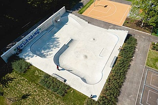Drone image of Orbeton skatepark with basketball court in the background